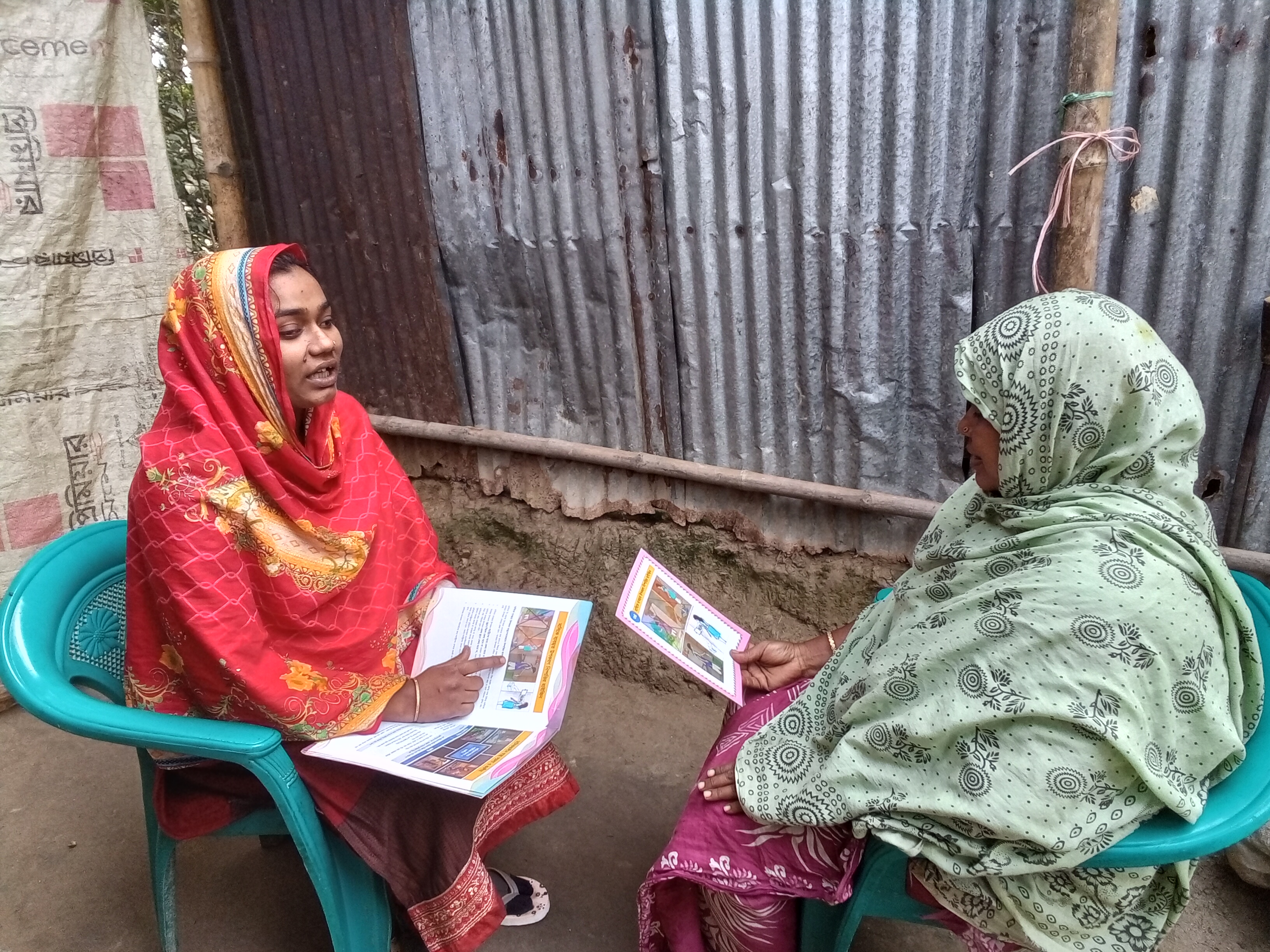 Hafzarun working as a Health Leader in her community