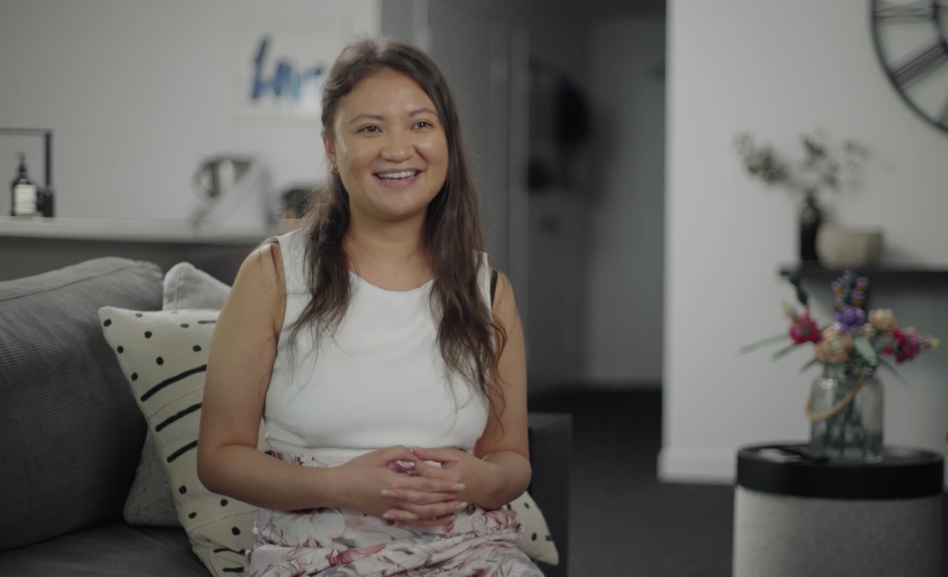 Thea sits during our interview