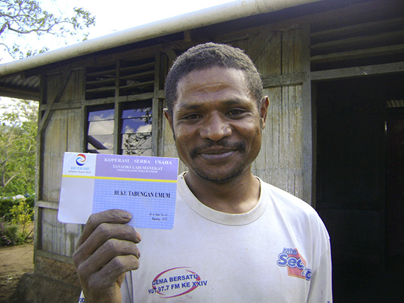 In an isolated area of West Timor, Amos supports his wife Yumince and their three  children with a small farm. Totally dependent on the plot of land, Amos’ income  fluctuates throughout the year – sometimes there isn’t enough money to even  afford the basics like clean water. A visiting mobile banking van has enabled Amos   to open his first savings account, helping him put money away to provide for his  family in the low season.